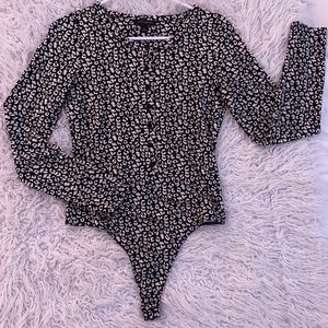 Black and white cheetah print long sleeve bodysuit from Banana Republic